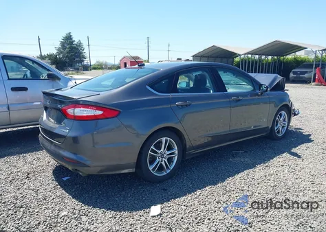 2016 Ford Fusion Hybrid Se z USA, uszkodzony, nr VIN 3FA6P0LU3GR386983